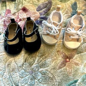 Newborn size 0 shoes. Black patent dress shoe and beige/tan sneaker